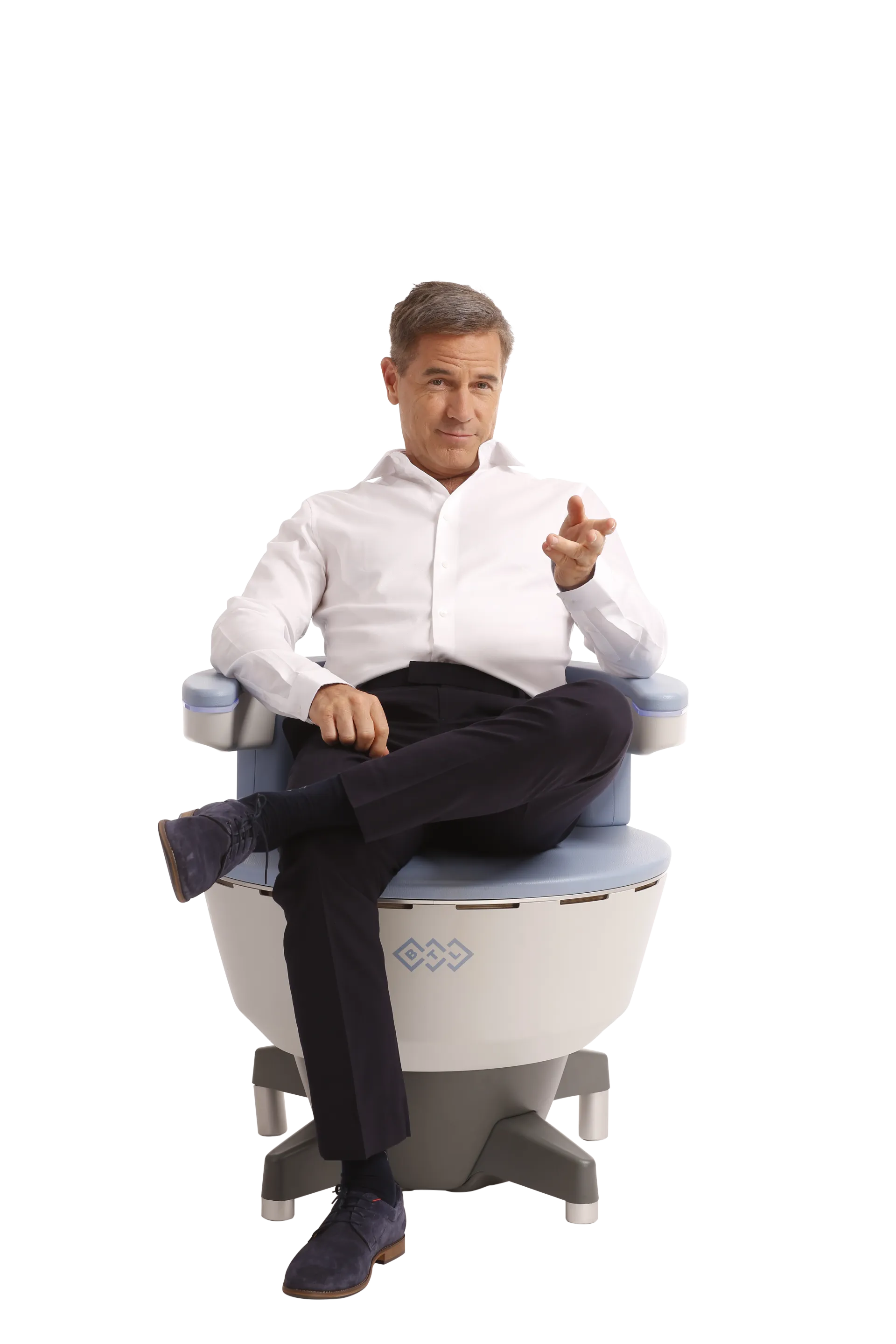 Man seated in the BTL Emsella chair at Xena Health